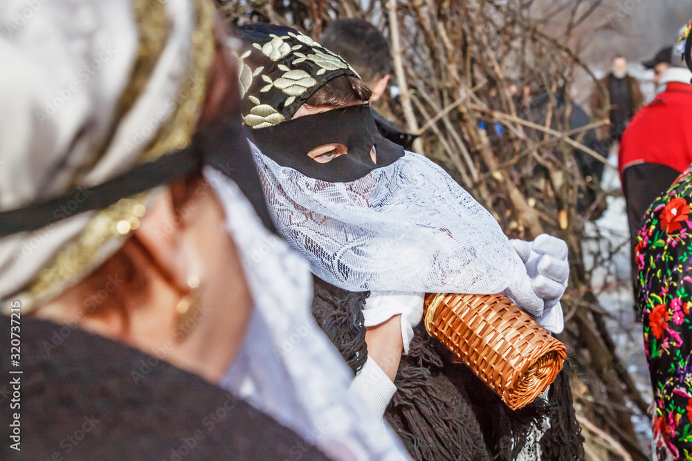 Unidentified people in masks; participants at the Mohacsi Busojaras, it is a carnival for spring greetings (Intangible Cultural Heritage of Humanity of the UNESCO).