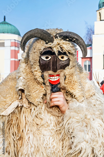 Obraz na płótnie Unidentified people in masks; participants at the Mohacsi Busojaras, it is a carnival for spring greetings (Intangible Cultural Heritage of Humanity of the UNESCO). w salonie