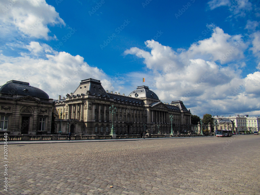 The Royal Palace of Brussels with blue sky and white clouds.