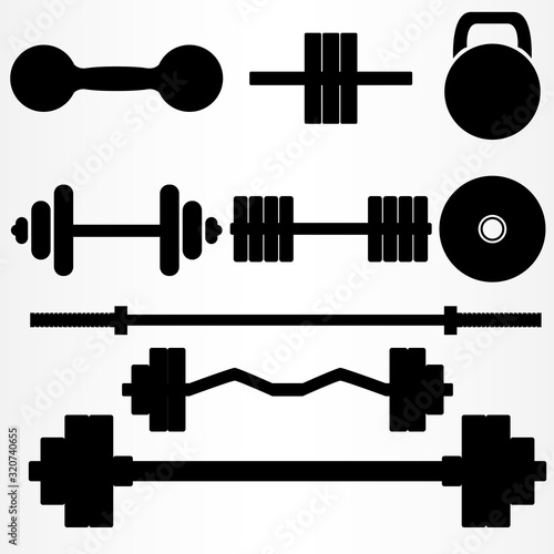 Classic elements of a sports hall. A set of nine elements of different barbell and dumbbells.