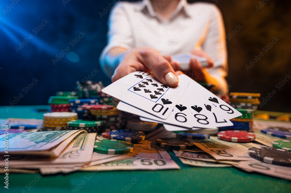 Fototapeta premium Casino player, winning combination, poker and gaming business. Concept of online gaming business and casino.