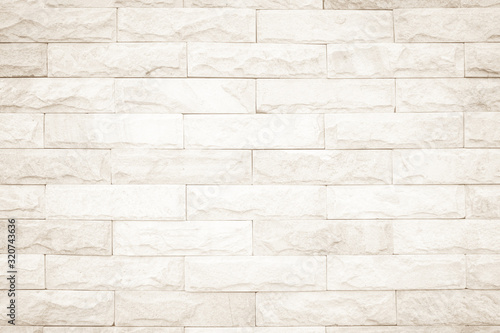 Cream and white wall texture background  brick stone pattern modern decor home and vintage stonework floor interior or design concrete old brickwork stack limestone seamless nature for copy space.