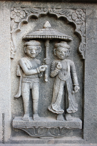 Sculpture on the outer walls of Shiva temple. Ahilyabai Holkar fort, Maheswar, Khargone, Madhya Pradesh, India photo