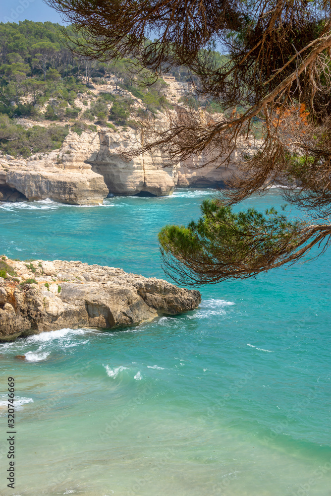 Cala Mitjana and Cala Mitjaneta in Menorca, Balearic islands, Spain Cala Mitjana and Cala Mitjaneta in Menorca, Balearic islands, Spain