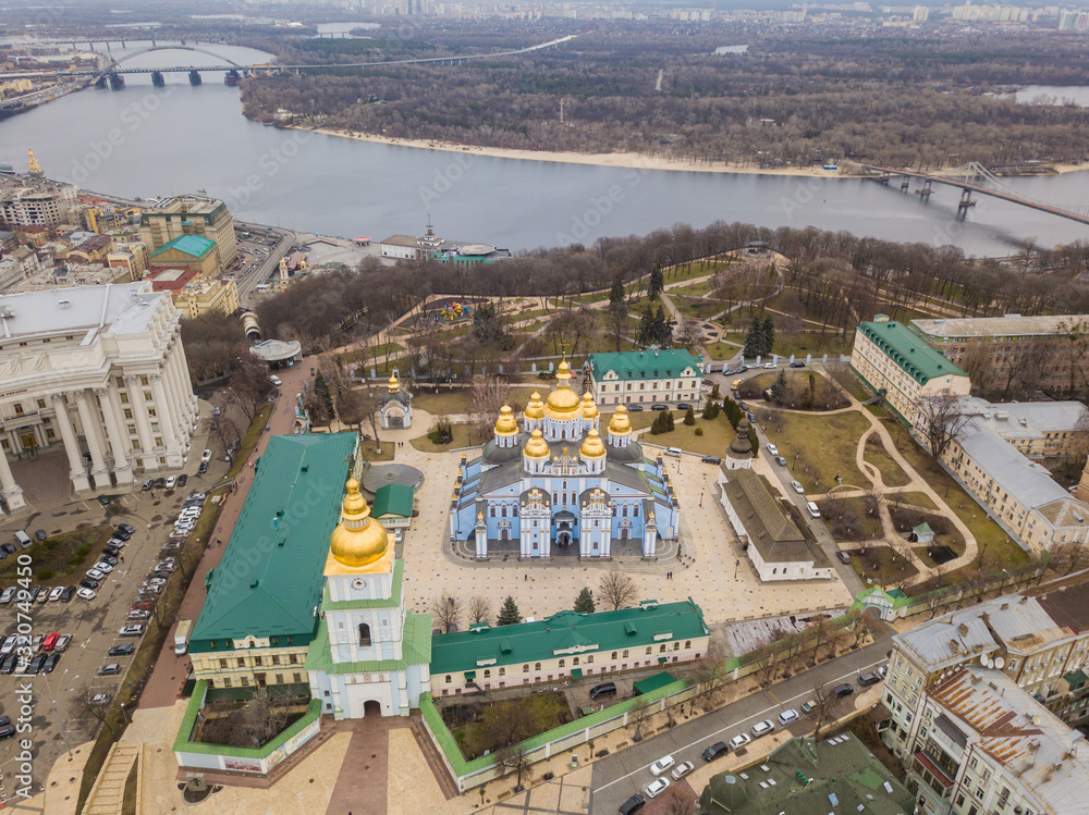 Aerial drone view. St. Michael's Cathedral in Kiev. Dnieper river on the background of the monastery.