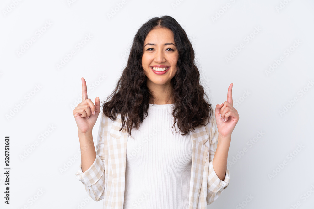 Mixed race woman over isolated white background pointing up a great idea Mixed race woman over isolated white background pointing up a great idea