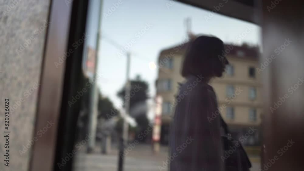 Reflection of girl in glass, buildings Reflection of girl in glass, buildings