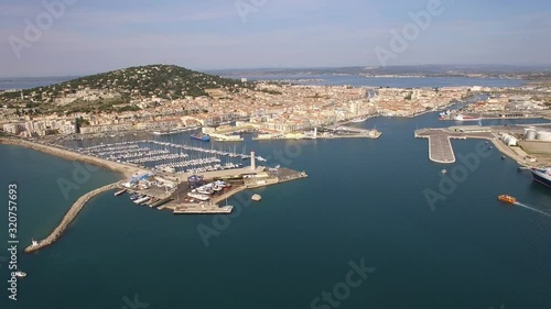 Zoom out, aerial view of the bay of Sete, south of France. Nice view of the harbor with sailboats and Mont Saint Clair in background.