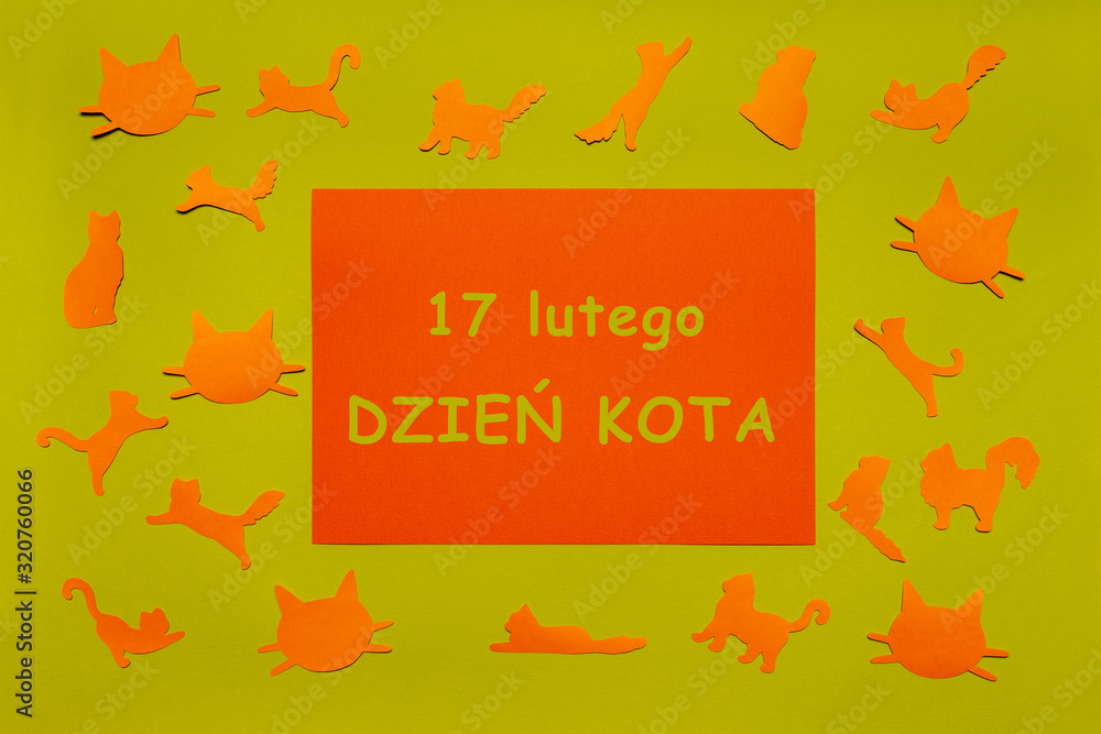 Happy Cat Day in Poland. Ginger cat silhouettes and funny faces, orange paper sheet on light green background. Festive layout for feline holiday, text in Polish 17 FEBRUARY CAT DAY. Flat lay Happy Cat Day in Poland. Ginger cat silhouettes and funny faces, orange paper sheet on light green background. Festive layout for feline holiday, text in Polish 17 FEBRUARY CAT DAY. Flat lay