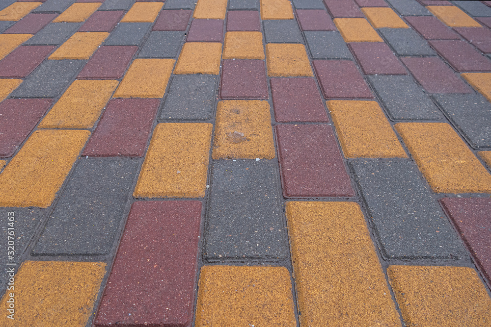background of colored tiles on the track in the park
