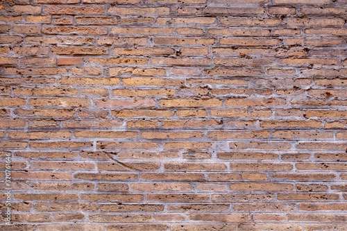 Old brick walls background and texture. The texture of the brick. Grungy old red brick wall.
