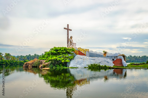 Saint Mary Statue Island in Poovar Lake, Thiruvananthapuram, Kerala, India. photo
