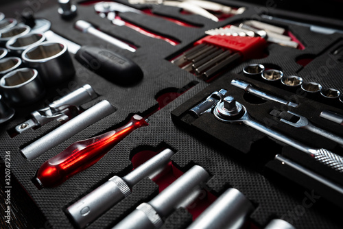 Professional work tools set for technicians in a stylish box. photo