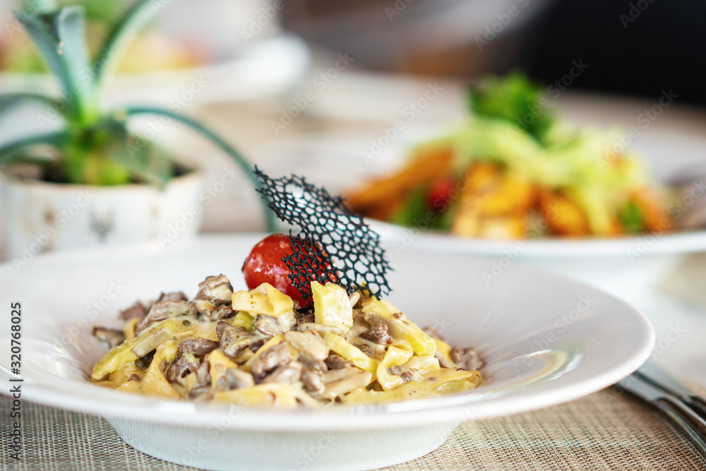 Ffettuccine with a delicious mushroom and cream in a luxury restaurant.