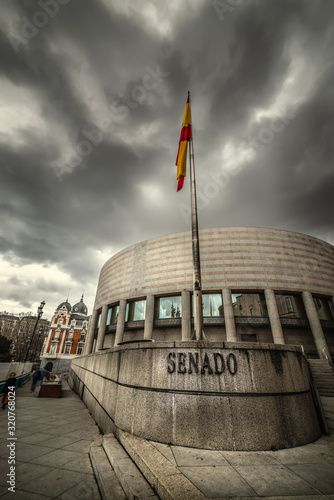 Senate building under an overcast grey sky in Madri photo