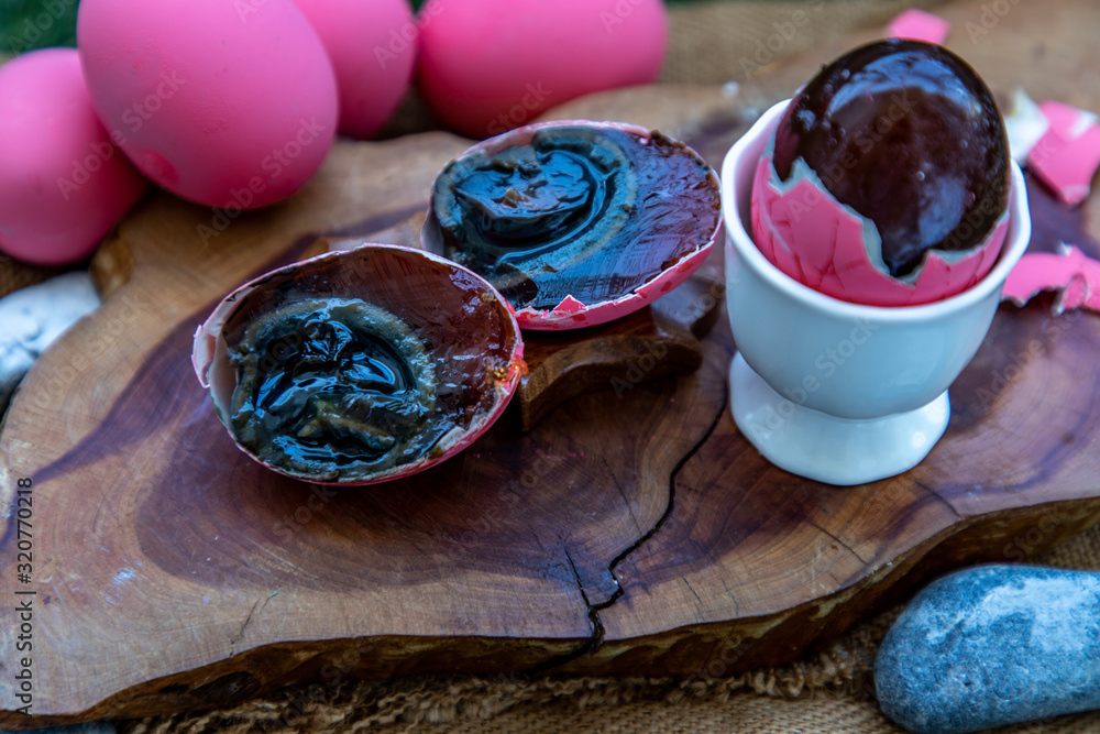 Pink Century eggs (Pidan Eggs) also known as preserved egg, hundred