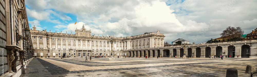 Royal Palace in Madrid under clouds