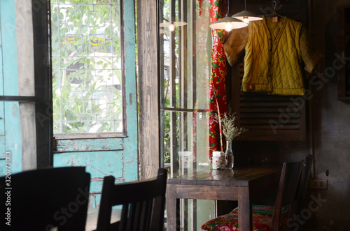 A beautiful cafe at old quarter with antique furniture and vintage setting.