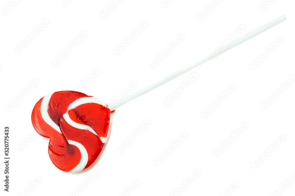 Rainbow heart-shaped Lollipop candy on white background, Valentine's Day concept Rainbow heart-shaped Lollipop candy on white background, Valentine's Day concept