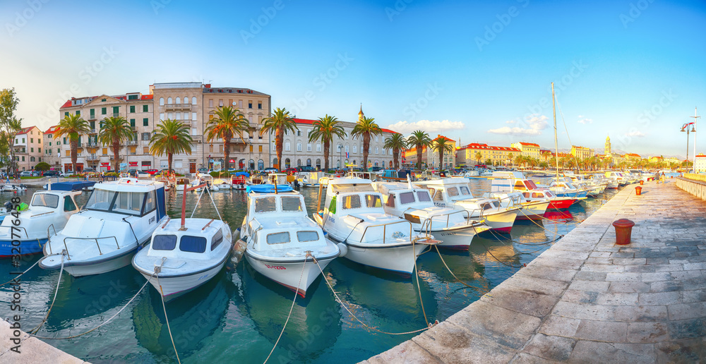 City center, cathedral tower, boats and yachts in marina of Split