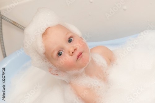  Little boy in a foam bath