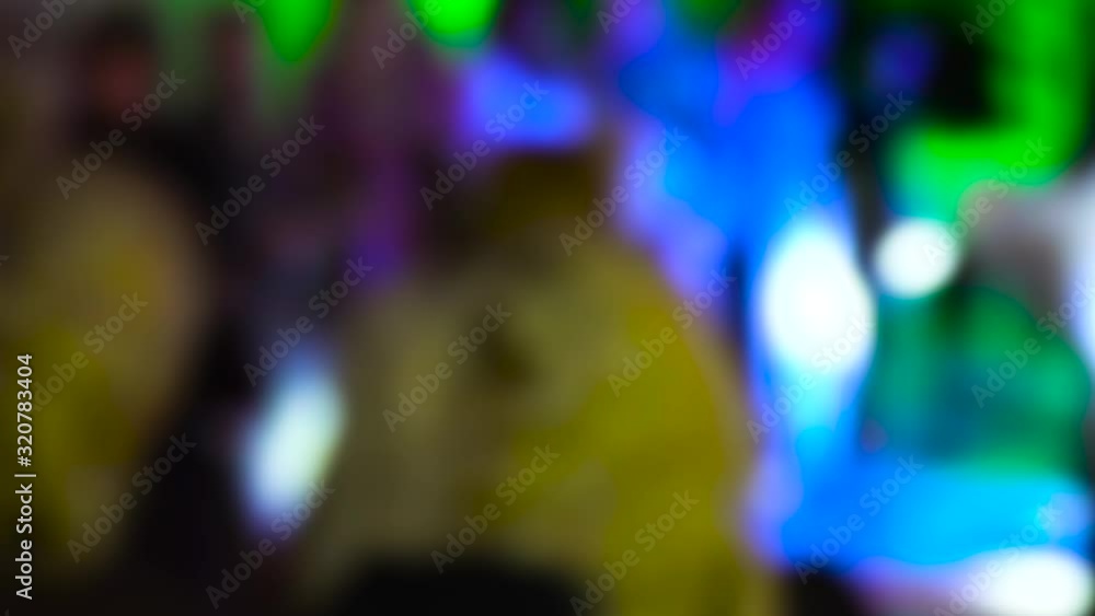 A leak of light, an open image of disco lights and dancing people. Background or backdrop for video editing. Colored flashes and highlights. A leak of light, an open image of disco lights and dancing people. Background or backdrop for video editing. Colored flashes and highlights.