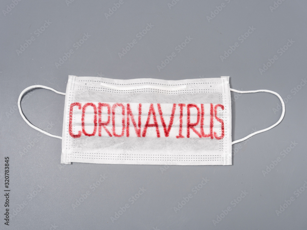 antiviral face mask on a gray background. coronavirus epidemic. antiviral face mask on a gray background. coronavirus epidemic.