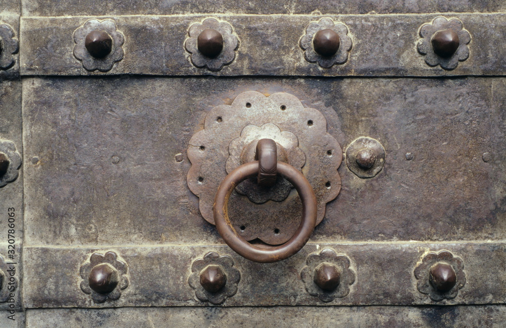 17th century style old circular door knocker, Pune, Maharashtra, India 17th century style old circular door knocker, Pune, Maharashtra, India