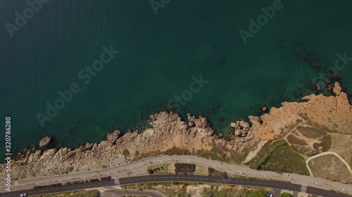 Drone top shot of south cost of Sete, South of France. Deep colors, and coastal road.