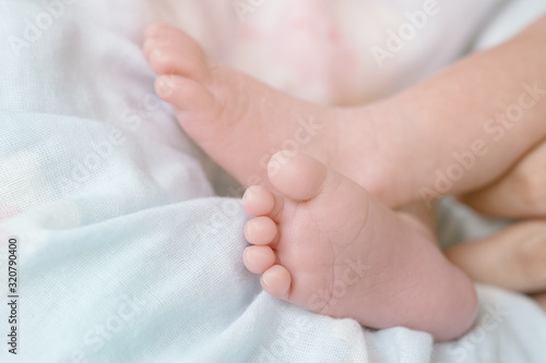 Closeup baby's foot with copy space