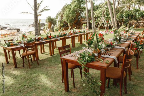 Fototapeta Naklejka Na Ścianę i Meble -  Luxury wedding decoration in the garden. Concept of tropical wedding, Sri Lanka