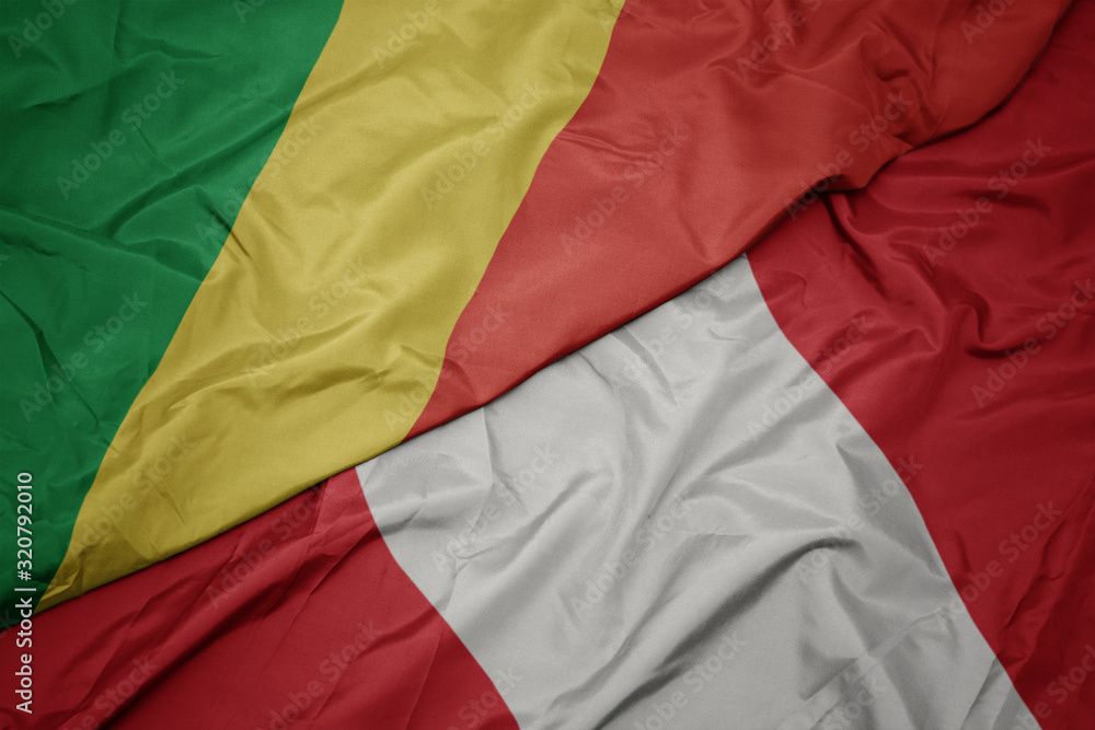 waving colorful flag of peru and national flag of republic of the congo. waving colorful flag of peru and national flag of republic of the congo.