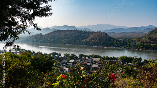 The river separate the mountain and town.