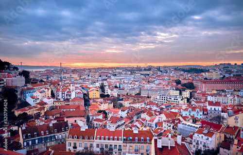 Lisbon cityscape during sunset in Portugal. © badahos