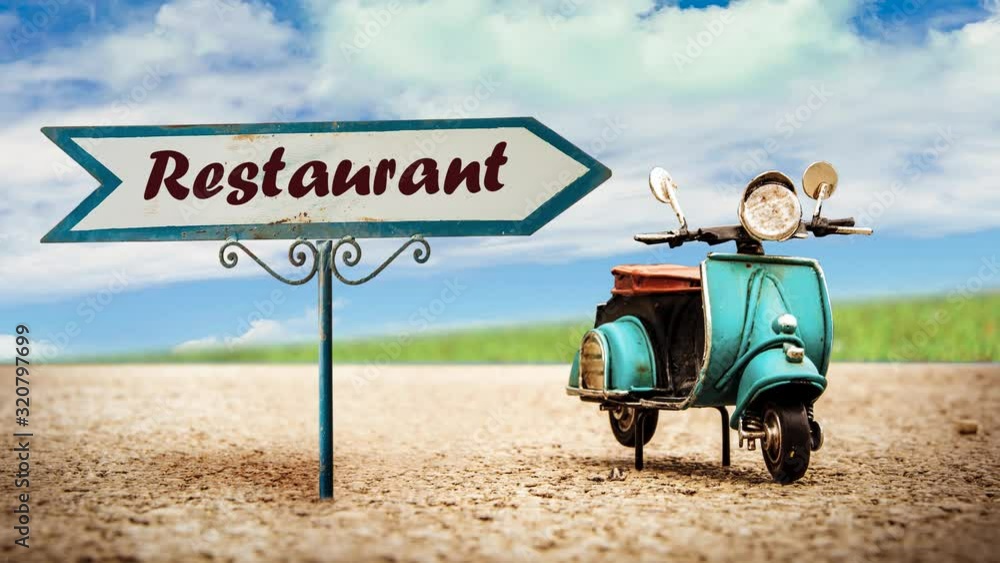 Street Sign the Way to Restaurant Street Sign the Way to Restaurant