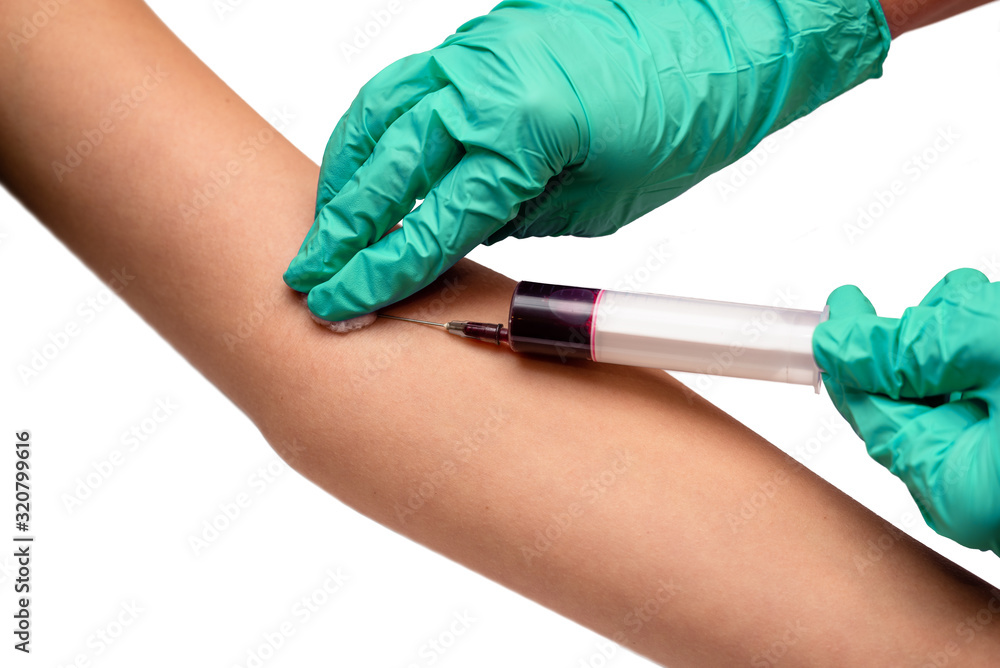 Closeup of female hands of nurse taking blood sample from patient isolated on white background. Coronavirus blood test. Virus infection detection concept.