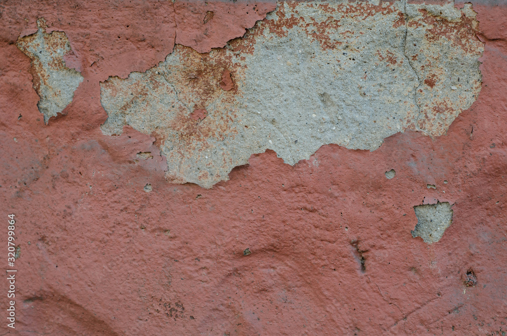 Old rusty surface. The paint is climbing off the wall. Old cracked paint. The wall is rusting. Old rusty surface. The paint is climbing off the wall. Old cracked paint. The wall is rusting.