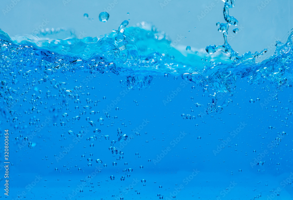 Water and air bubbles over white background with space for text. Water and air bubbles over white background with space for text.