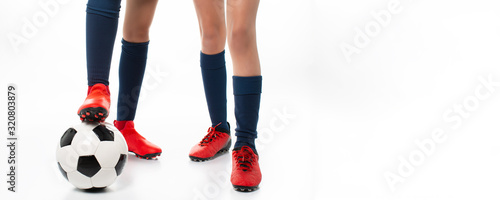 two women posing soccer players isolated on white background,banner