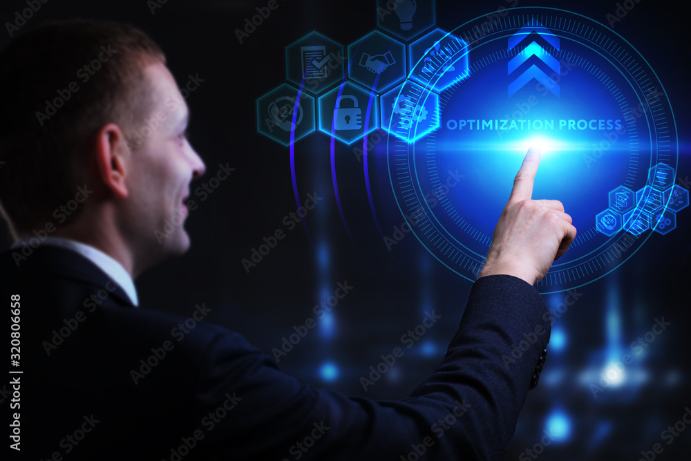 Business, Technology, Internet and network concept. Young businessman working on a virtual screen of the future and sees the inscription: Optimization process Business, Technology, Internet and network concept. Young businessman working on a virtual screen of the future and sees the inscription: Optimization process