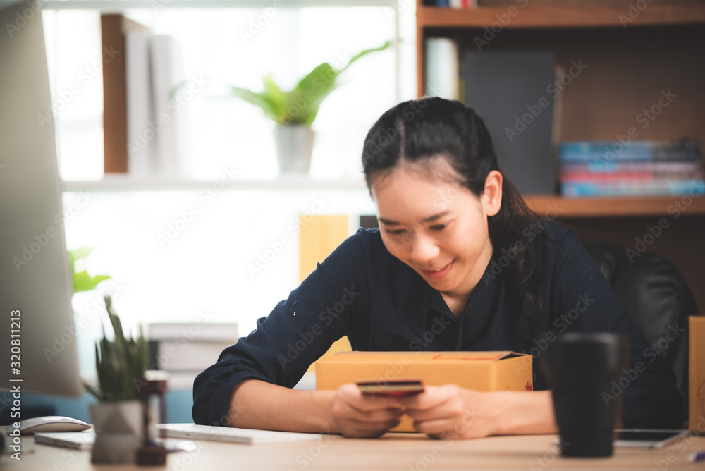 Young business woman working online shopping at her home Young business woman working online shopping at her home