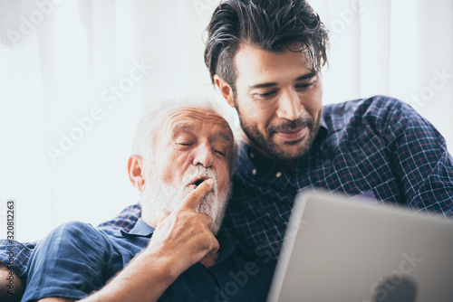 An adult hipster son and se...