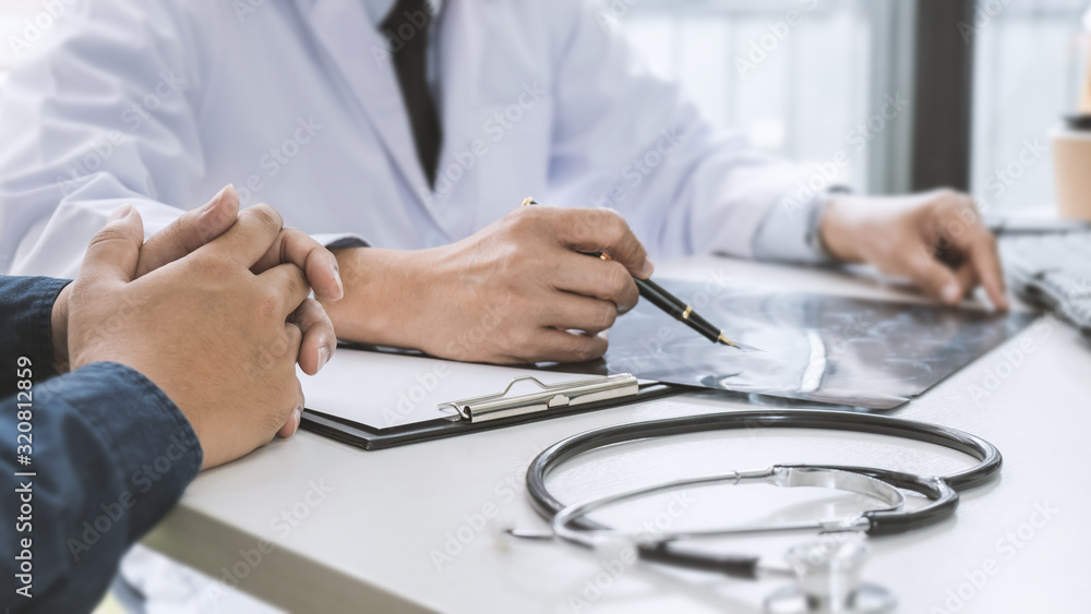 Doctor with patient in medical clinic or hospital. Doctor with patient in medical clinic or hospital.