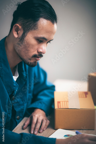 Small business owner packin...