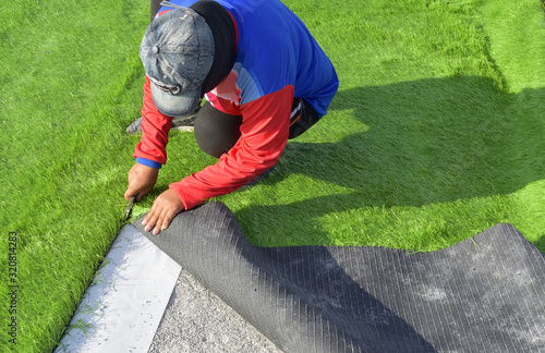 Fotografija Damaged artificial turf football field