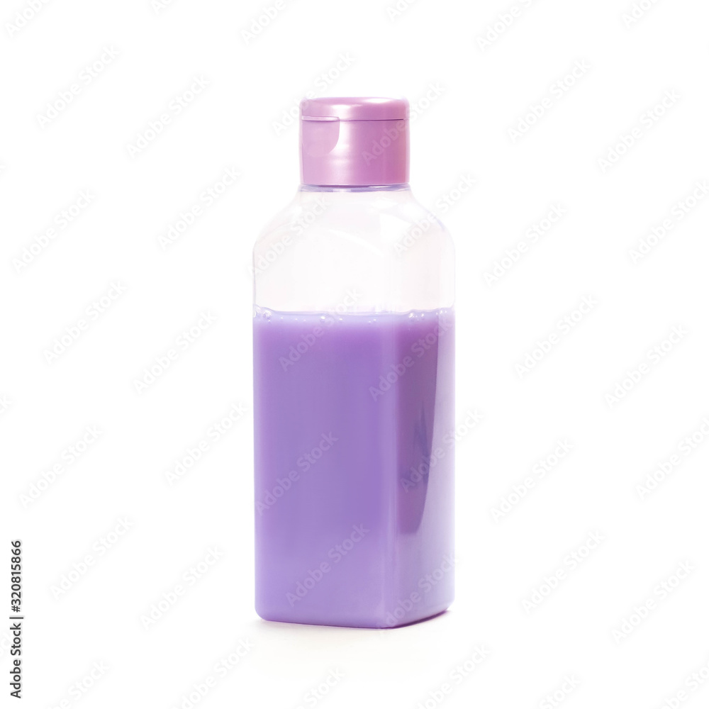 A small bottle of purple liquid. Close up. Isolated on a white background