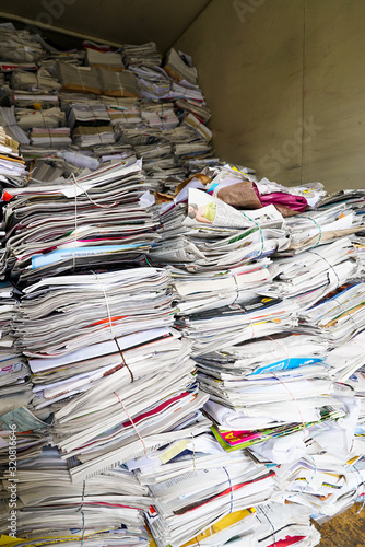 close up view of stacks of paper and magazines and newspapers ready to be recycled