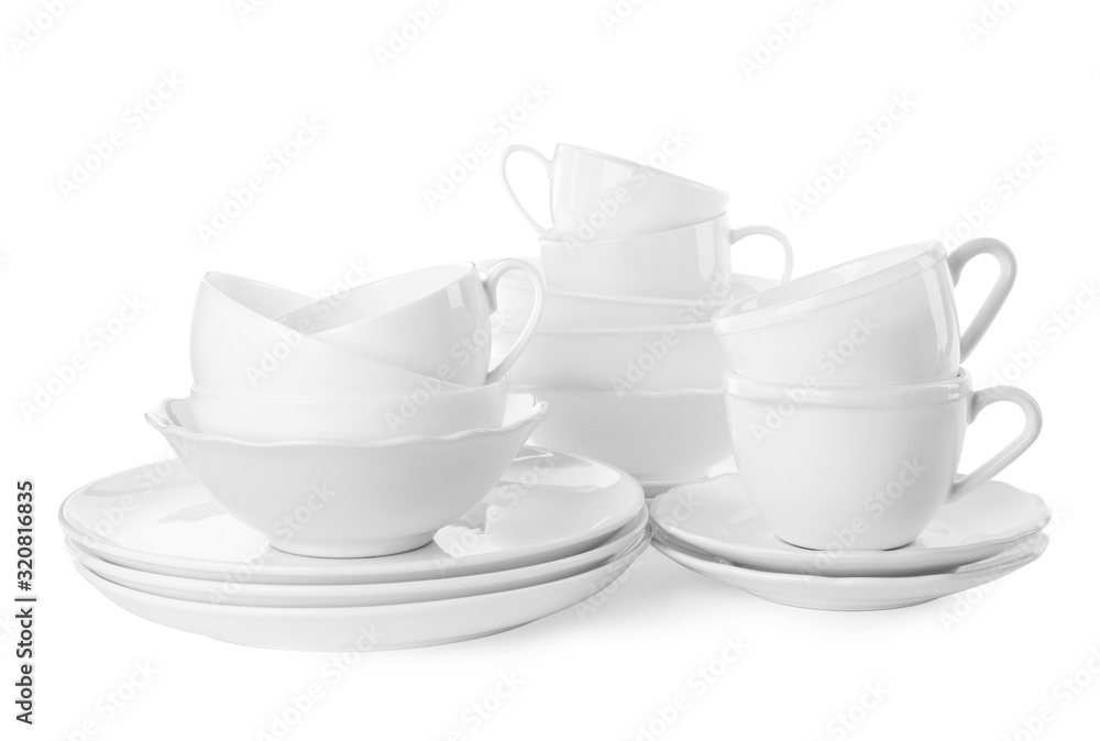 Set of clean tableware isolated on white