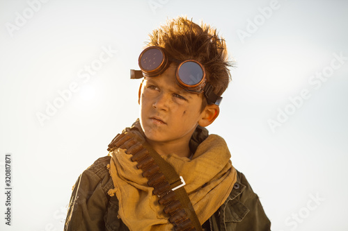 Valokuva Post-apocalyptic Warrior Boy Outdoors in a Wasteland