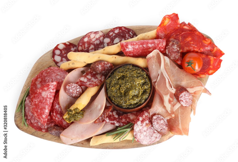 Wooden board with tasty ham and other delicacies isolated on white, top view